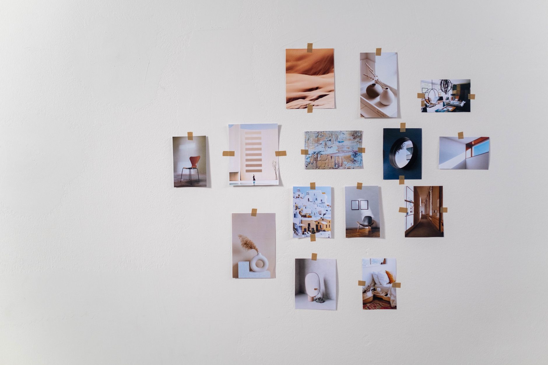photographs on a wall consisting an interior design moodboard